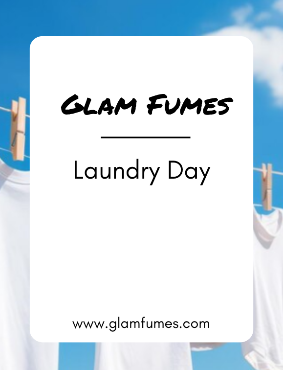 A white card with the brand name 'Glam Fumes' and the home diffuser oil and linen spray name 'Laundry Day' written on it, against a background of clothes hanging on a clothesline with a blue sky.